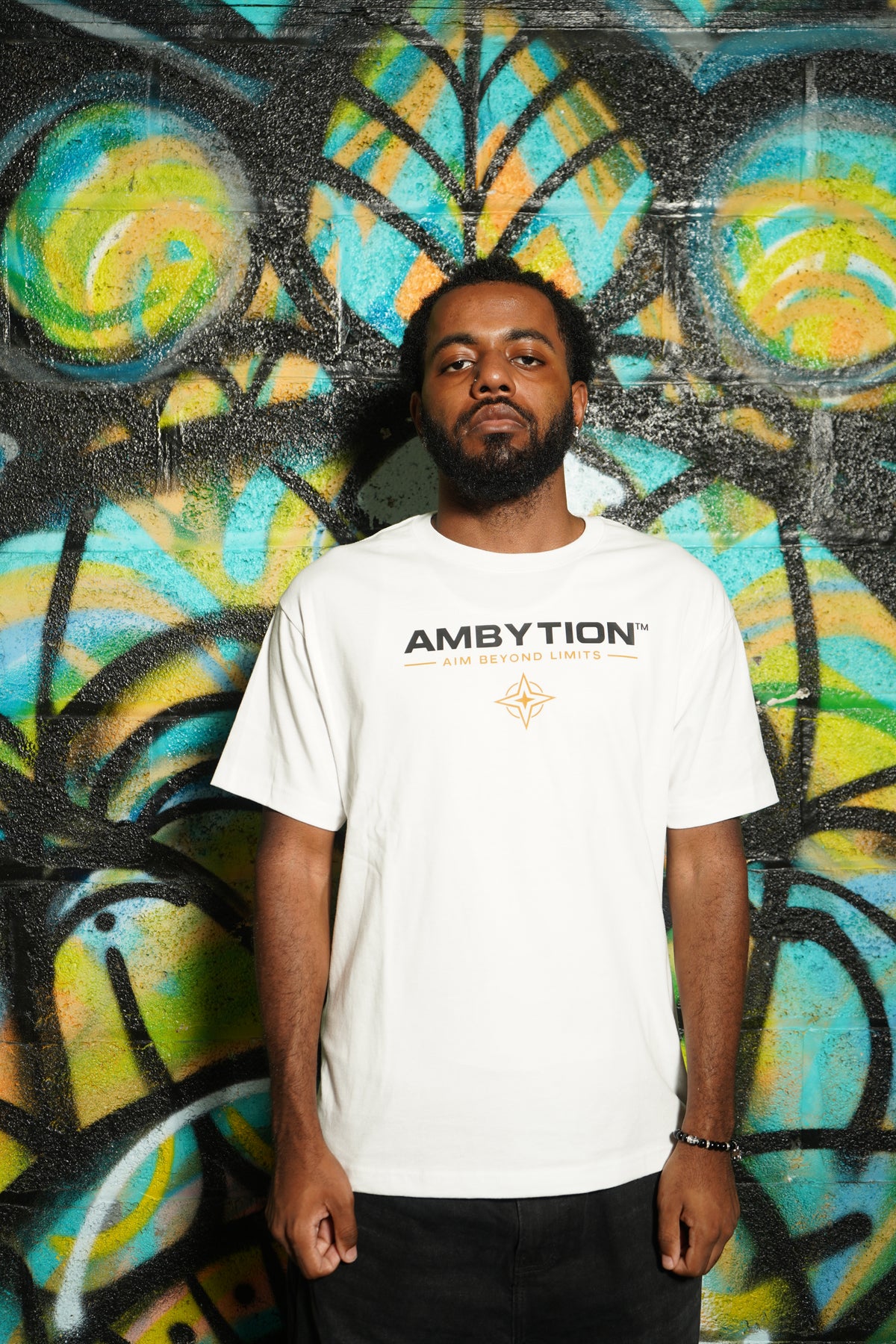 AMBYTION™ Driven By Ambytion Tee – White