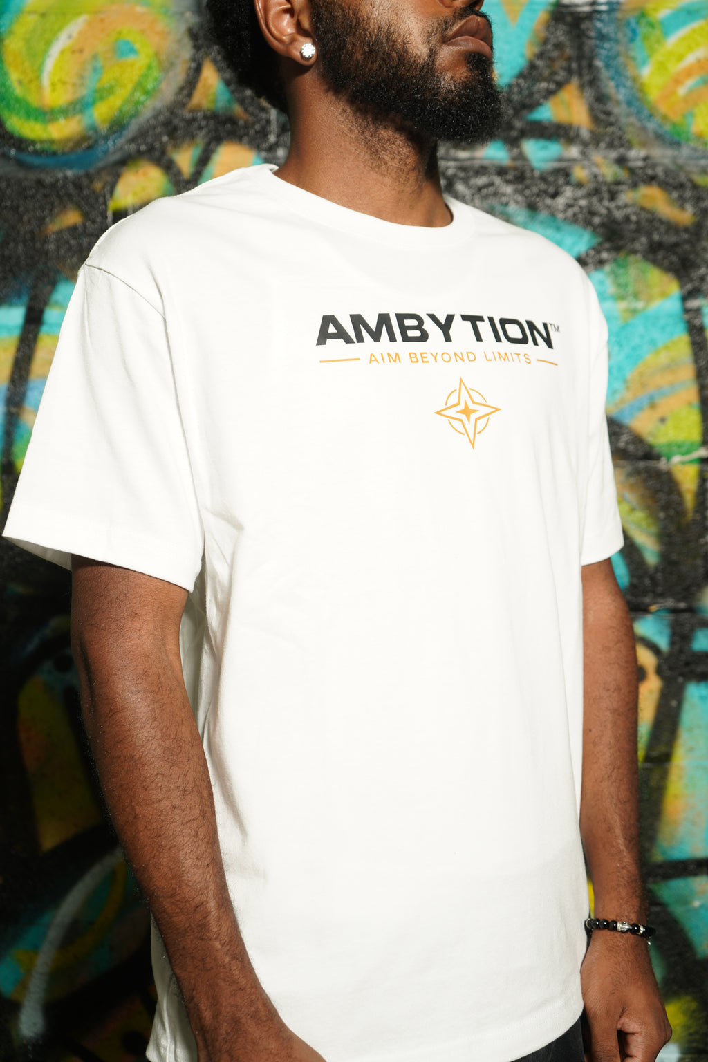 AMBYTION™ Driven By Ambytion Tee – White