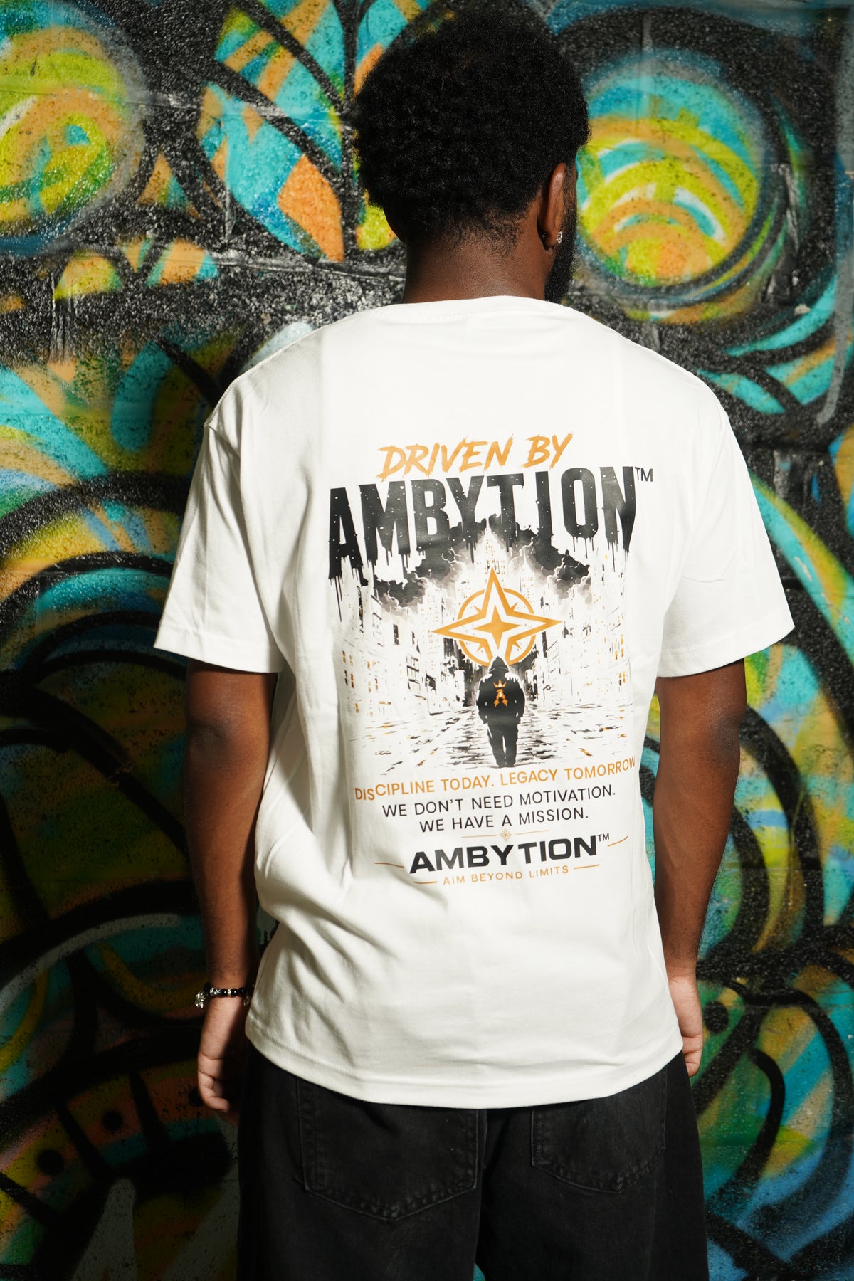 AMBYTION™ Driven By Ambytion Tee – White